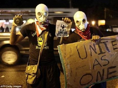 ferguson-gas-masks-AFP