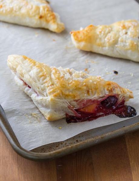 Cherry & Peach Turnovers with a Sweet Bourbon Glaze.  Ready in under 40 minutes!  | sweetpeasandsaffron.com