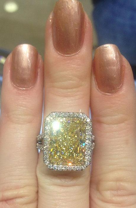 Internally flawless radiant cut fancy yellow diamond engagement ring
