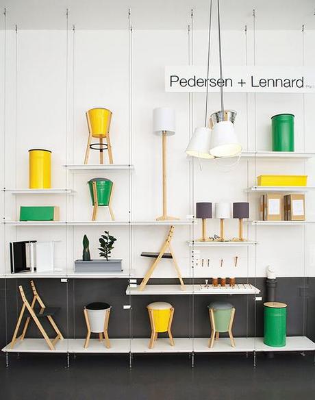 Furniture wall in Cape Town with bright bucket stools