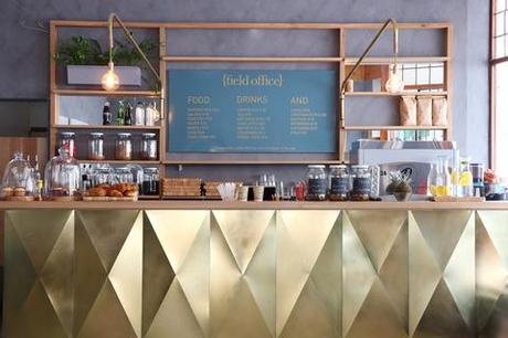 Field Office coffee shop with golden bar with menu board