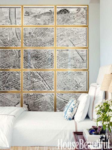 house beautiful traditional neutral master bedroom design with gallery wall of maps