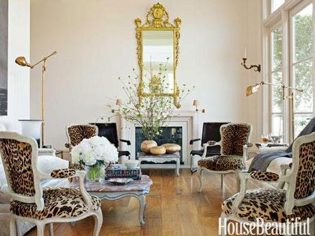 house beautiful neutral living room decor leopard chairs