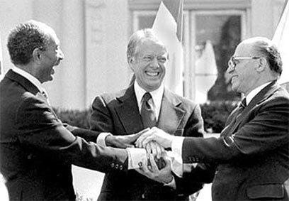 Signing the accords on the White House lawn 11-19-77