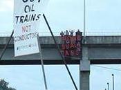 Seattle Resident Suspends Herself From Tripod Block Coal Trains
