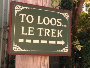 Sign pointing to the toilet at McCrossin's Mill Museum, Uralla, Australia