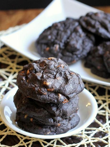 Loaded Dark Chocolate Cookies \\ loaded with butterscotch chips, peanut butter chips, caramel bits, + dark chocolate chips. Hello, delicious! | from Bakerita.com