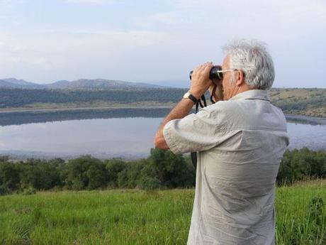 Bird watching Lake Nyamunuka crater lake, north of Mweya, Queen Elixabeth National Park