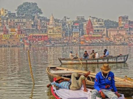 Locals hanging out on the Ganges in Varanasi, India