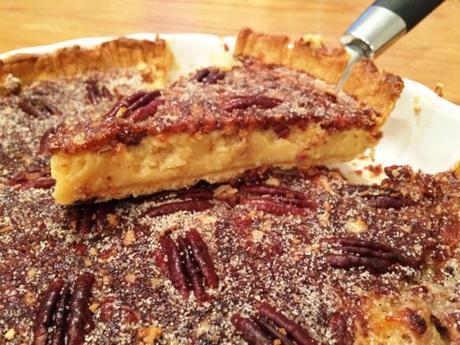 slice of salted caramel pecan pie served warm