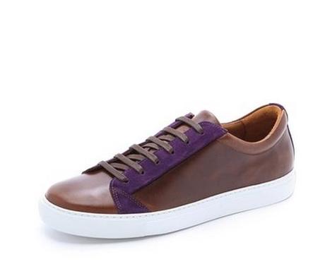 A leather sneaker by The Generic Man 